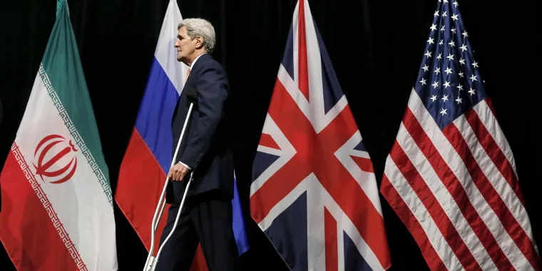 U.S. Secretary of State John Kerry leaves the stage at the Vienna International Center in Vienna, Austria on July 14, 2015 during talks in which Iran and six major world powers reached a nuclear deal. 