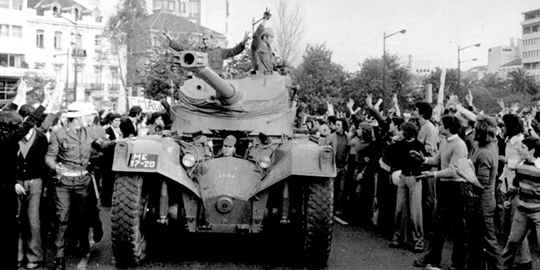 Soldiers in a tank drive through Lisbon, Portugal, during the military coup on April 25, 1974. That year, Portugal withdrew from its African colonies, including Mozambique and Angola. South Africa’s apartheid government feared communist influences in thos