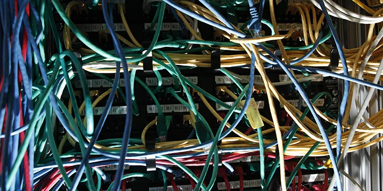 Internet cables are seen at a server room in Warsaw on January 24, 2012. A global network of cables allows data to be transmitted across the internet.