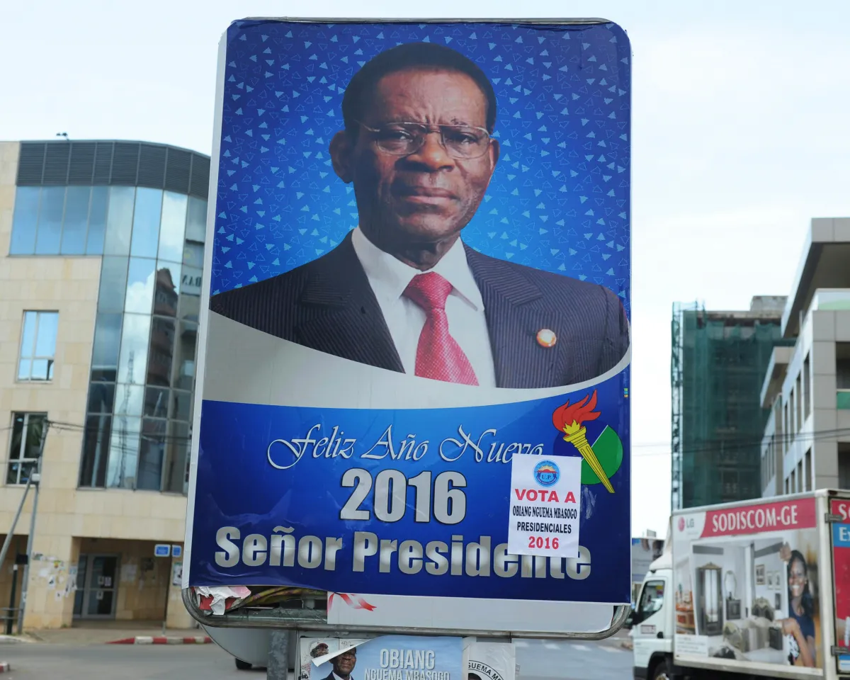 A photo showing an electoral poster of Equatorial Guinea President Teodoro Obiang wishing citizens a "happy new year" in the capital city of Malabo on April 23, 2016.