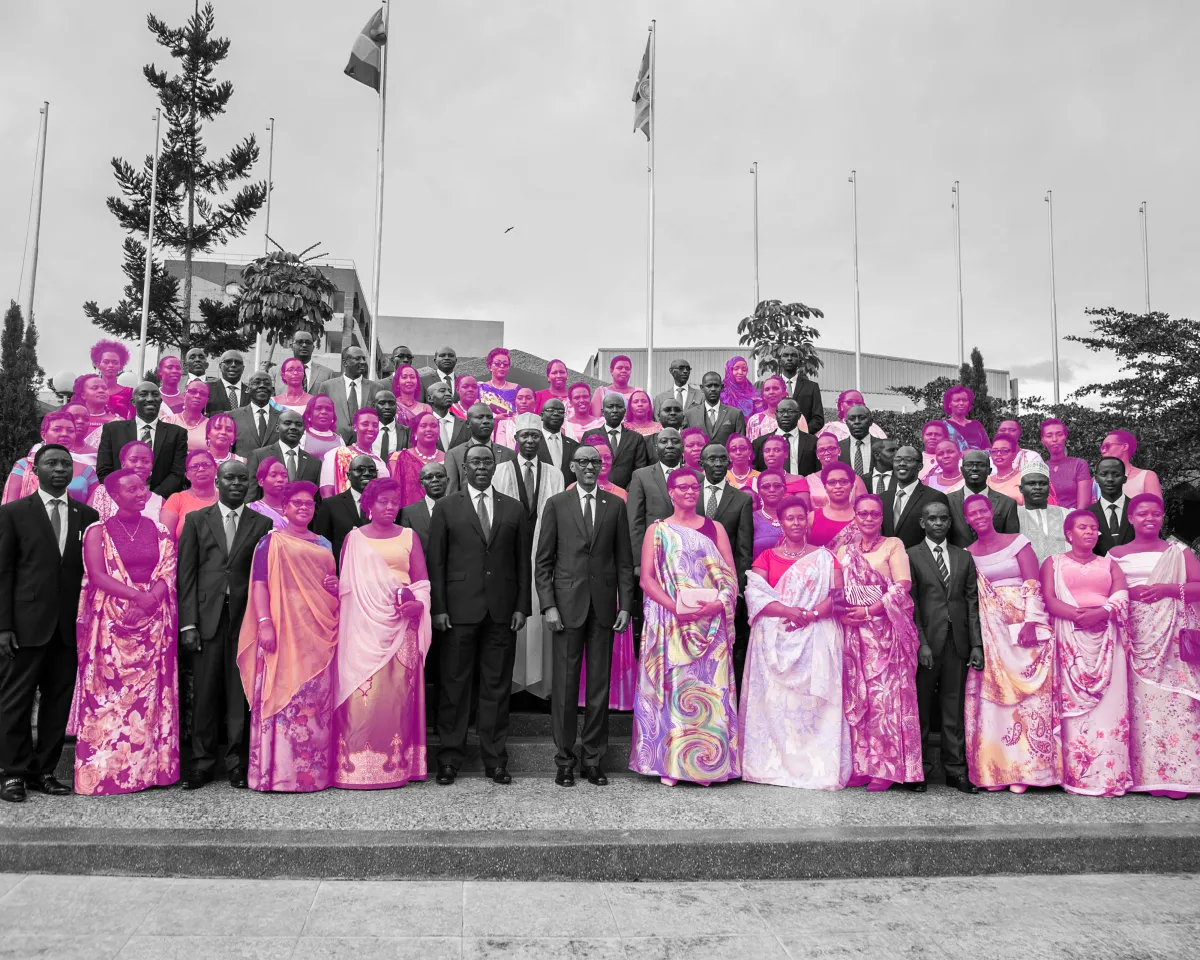 A photo showing demale legislators highlighted pink in photo of Rwandan President Paul Kagame posing with 80 new members of the country’s parliament on September 19, 2018.
