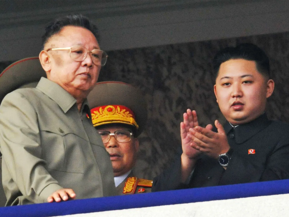 A photo showing North Korean leader Kim Jong Il reviewing a military parade in Pyongyang with his son Kim Jong Un on October 10, 2010.