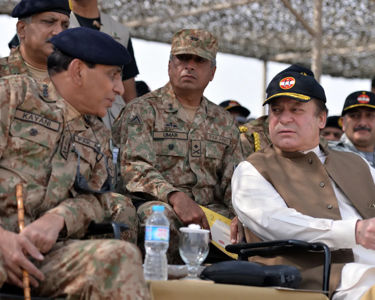 A photo showing Pakistani Prime Minister Nawaz Sharif sitting with Pakistani Army Chief General Ashfaq Kayani at a military exercise in Bahawalpur Distirict on November 4, 2013.
