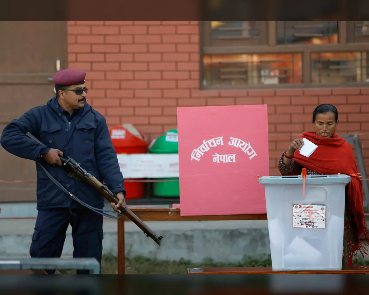 A photo showing a woman casting her vote during parliamentary and provincial elections in Bhaktapur, Nepal, on December 7, 2017.