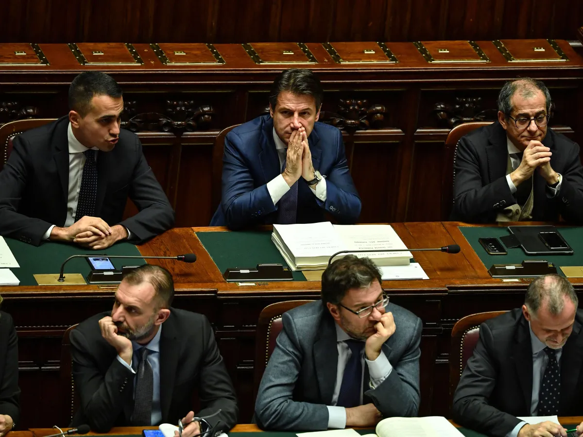 A photo showing Italy's Prime Minister Giuseppe Conte and fellow lawmakers attending a parliamentary session on Italy's 2019 budget on December 29, 2018 in Rome, amidst complaints it was written by Brussels.