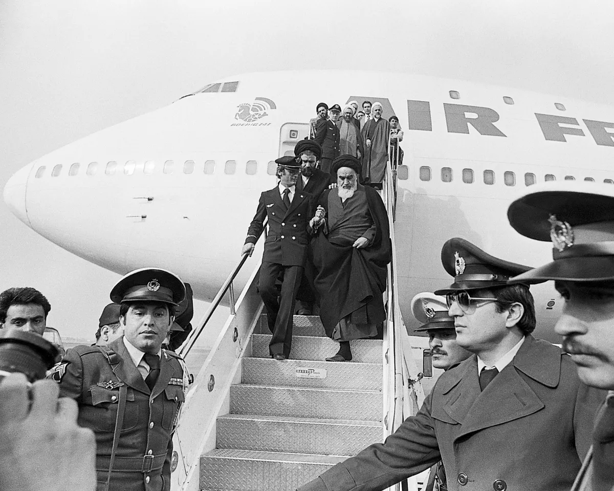 A photo of Ayatollah Ruhollah Khomeini arriving in Tehran, Iran after 15 years of exile on February 1, 1979.