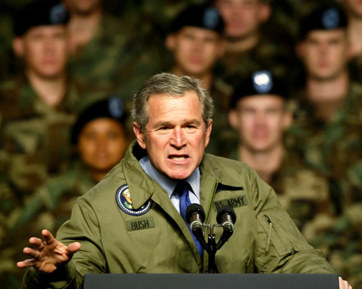 A photo showing then-President George W. Bush addressing U.S. Army soldiers at Fort Hood, Texas about the possibility of military action against Iraq on January 3, 2003.