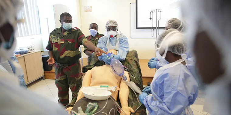 Medical staff members wear personal protective equipment (PPE) during training of resuscitation techniques for COVID-19 coronavirus patients at the School of Military Health Enforcement in Libreville, Gabon, on May 13, 2020.