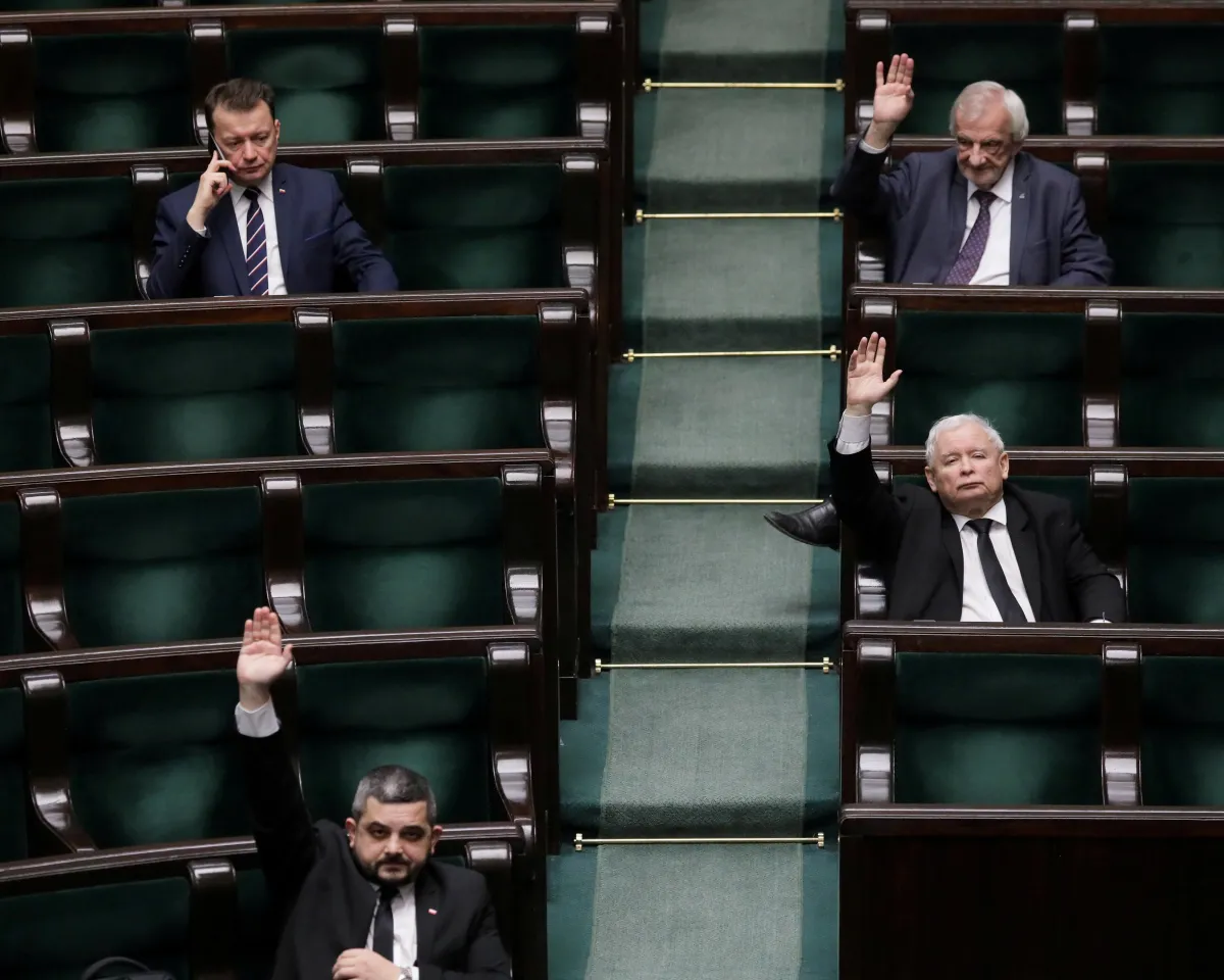 A photo showing Law and Justice (PiS) leader Jaroslaw Kaczynski and other parliamentarians voting at Polish Parliament during the coronavirus disease (COVID-19) outbreak in Warsaw, Poland, on April 6, 2020. 