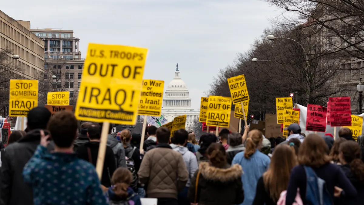 Anti-war demonstrators march during a demonstration against war in Iraq and Iran on January 4, 2020 in Washington, DC.