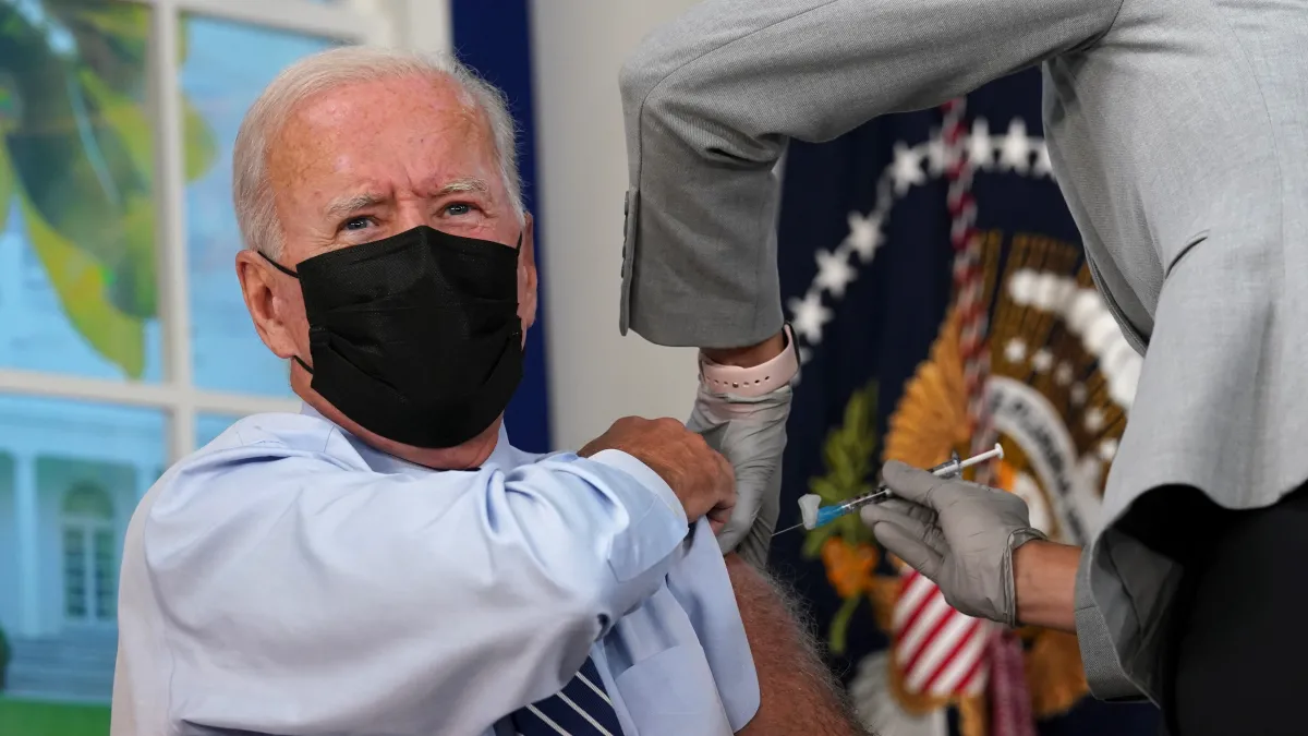 U.S. President Joe Biden receives his coronavirus disease (COVID-19) booster vaccination at the White House in Washington, U.S., September 27, 2021.