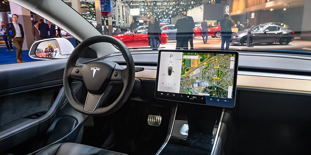 Tesla Model 3 compact full electric car interior with a large touch screen on the dashboard on display at Brussels Expo on January 9, 2020 in Brussels, Belgium. 
