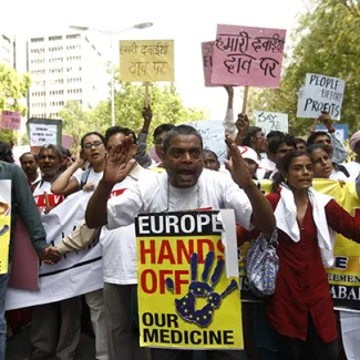 Demonstrators hold a rally in New Delhi, India, on April 10, 2013, to protest a potential free trade agreement between the European Union and India that could restrict exports of cheap anti-HIV medicines to developing countries.