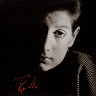Ryan White's face and signature from a 1980s Indiana State Board of Health poster promoting AIDS hotlines.