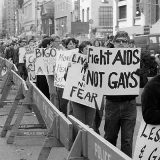 Demonstrators protest near City Hall in New York as a City Council committee considered legislation to bar pupils and teachers with the AIDS virus from public schools on November 15, 1985.