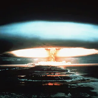 A nuclear bomb detonates at the Mururoa atoll, French Polynesia in 1971.
