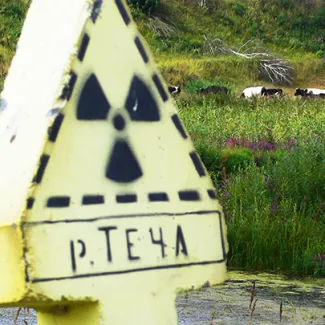 A nuclear radiation sign warns of a contaminated area along the Techa River in Russia.