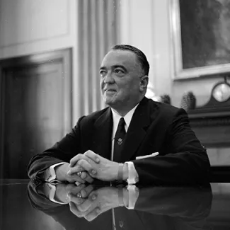 J. Edgar Hoover, shown in this May 1959 photograph, was the first FBI director and served in the position for thirty-seven years.