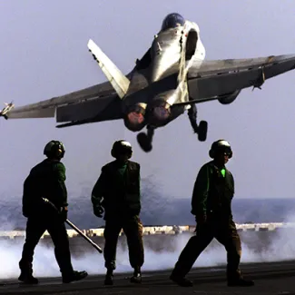 A Navy F-18 Hornet takes off from the aircraft carrier USS Carl Vinson in the Arabian Sea, on November 12, 2001. Planes from the ship took part in Operation Enduring Freedom strikes against al-Qaeda and Taliban targets inside Afghanistan.
