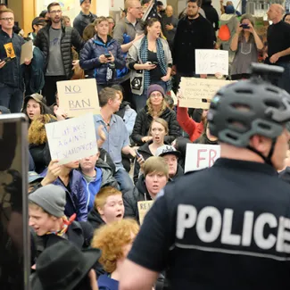 Demonstrators protest against the Trump administration’s immigration ban at Seattle-Tacoma International Airport, on January 28, 2017.