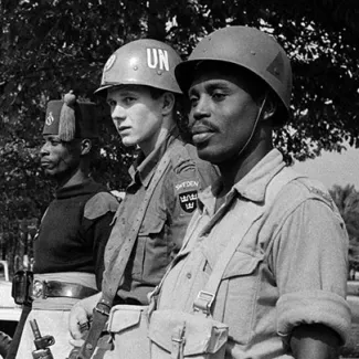 Soldiers from various contingents stand guard in Leopoldville (present-day Kinshasa), Republic of the Congo (present-day Democratic Republic of the Congo), on August 12, 1960.
