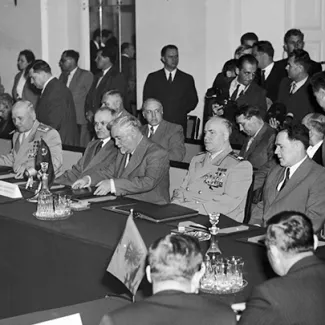 The Soviet delegation was present for the signing of the Warsaw Pact on May 14, 1955.