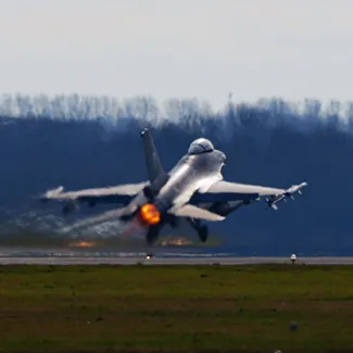 An F-16 takes off from Leeuwarden Airbase for the Italian island of Sardinia on March 24, 2011.