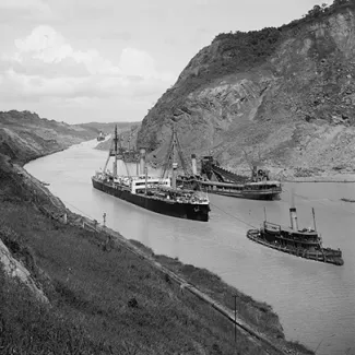 The SS Kentuckian (left) transits the Panama Canal some time between 1910 and 1920.