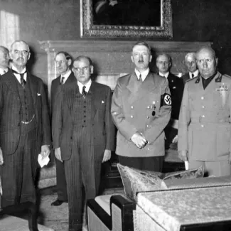 Adolf Hitler and Benito Mussolini (third and fourth from left), with Mussolini's son-in-law and Italian Foreign Minister Galeazzo Ciano (right), British Prime Minister Neville Chamberlain (left) and French Premier Edouard Daladier at the Munich Peace Conference in Germany in October 1938.