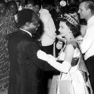Queen Elizabeth II of Great Britain dances with President Kwame Nkrumah of Ghana, during her visit to Accra, Ghana, in 1961.