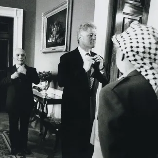 U.S. President Bill Clinton, Israeli Prime Minister Rabin, Egyptian President Hosni Mubarak, Jordan's King Hussein, and Arafat are pictured on September 28, 1995 after signing the Israeli-Palestinian Interim Agreement at the White House.
