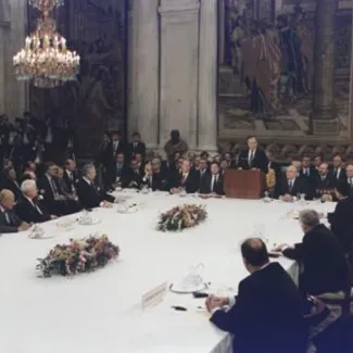 President George H.W. Bush addresses the Middle East Peace Conference at the Royal Palace in Madrid, Spain, on October 30, 1991.