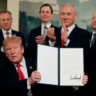 President Trump holds a proclamation recognizing Israel's sovereignty over the Golan Heights as he is applauded by Israel's Prime Minister Benjamin Netanyahu and others during a ceremony at the White House in Washington DC, on March 25, 2019.
