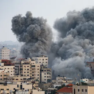 Smoke rises in Gaza following Israeli strikes on October 9, 2023.
